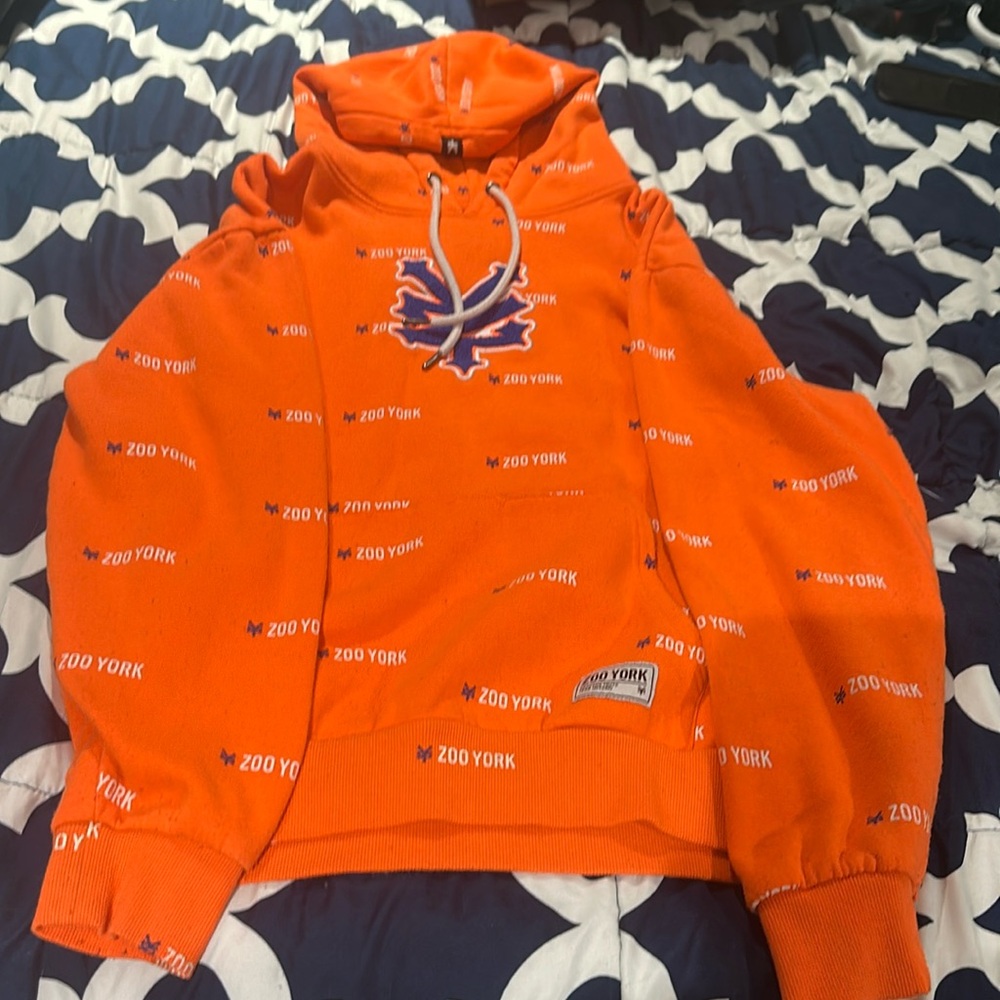 Zooyork, orange hoodie.. men’s large.